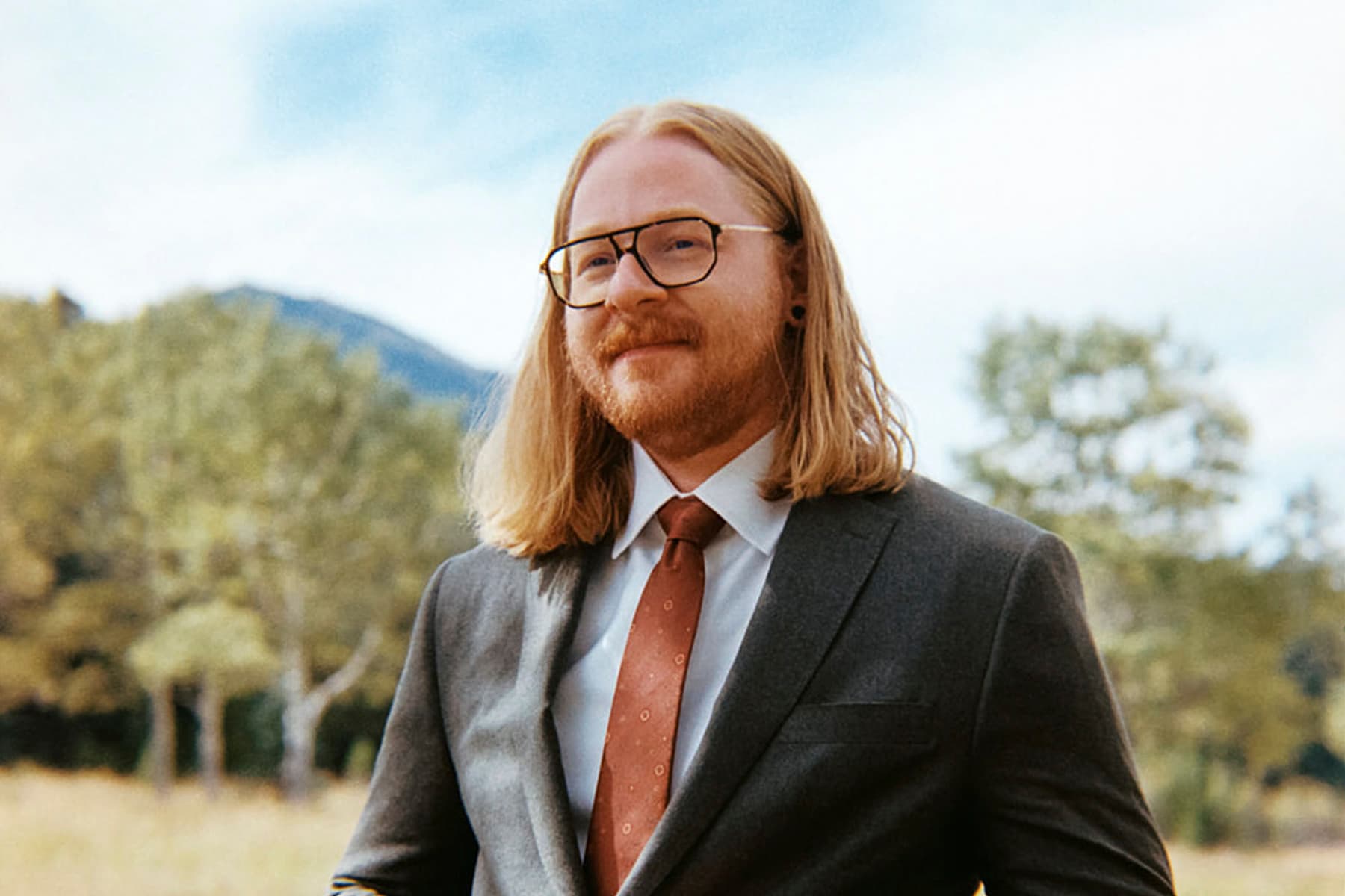 an aerial drone photo of a luxury home exterior