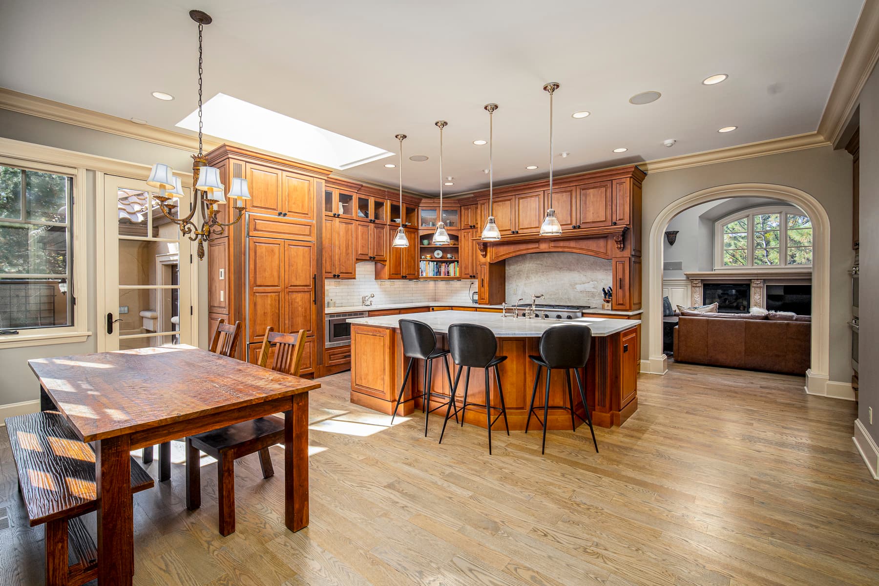 a comfortable looking bedroom with built-in bookshelves