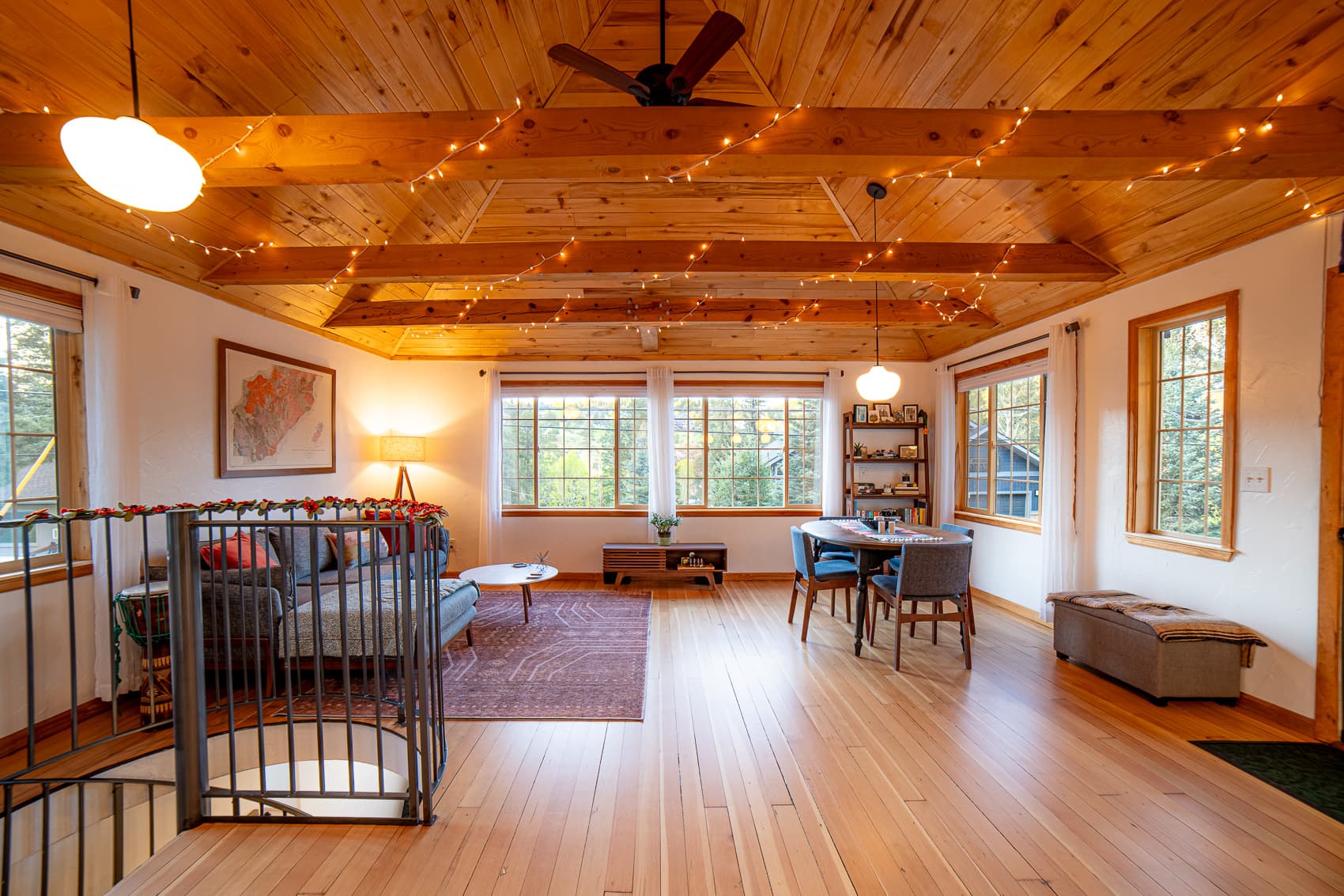a wide shot of a comfortable, wood-accented living room interior